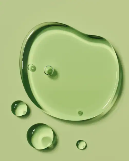 Green retinol and retinal serum texture used in skincare comparison