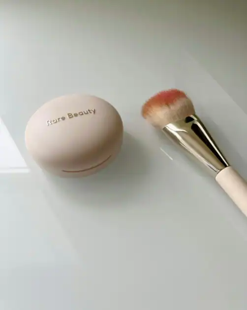 Rare Beauty blush compact and blush brush showing how to choose the right blush