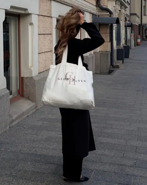 Glowhaven founder Ida wearing the Glowhaven tote bag after 3 months of blogging